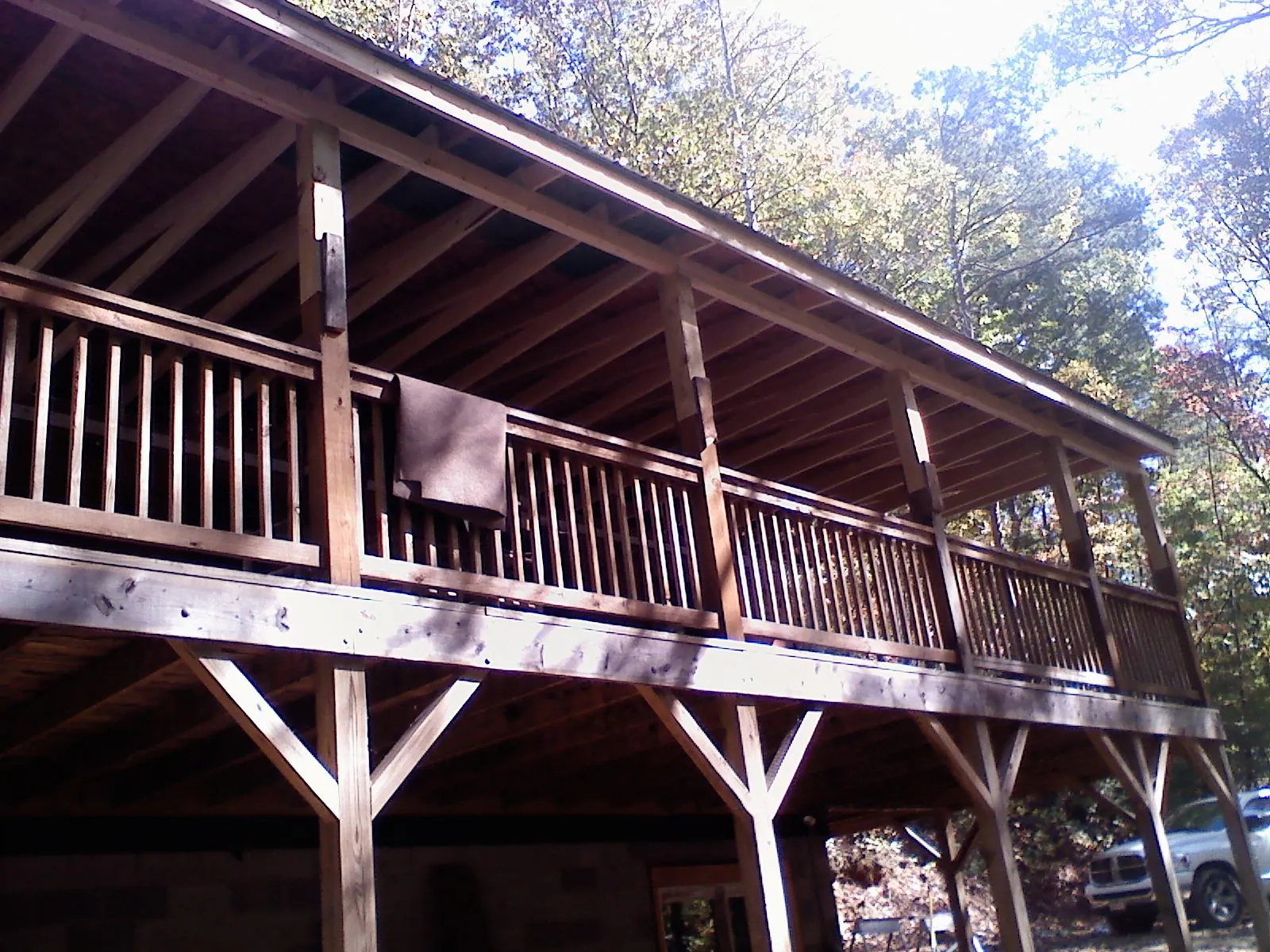 Timber framing under a new elevated porch and deck — Roof Leak Repair in Braggs by Roofing Brothers